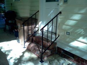 CUSTOM WROUGHT IRON HANDRAILS FROM CARPORT TO HOME