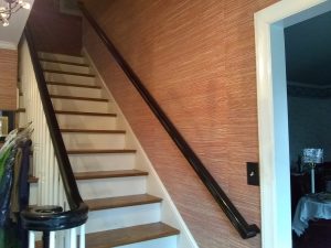 SECOND HANDRAIL INSTALLED ON GRASSCLOTH WALL